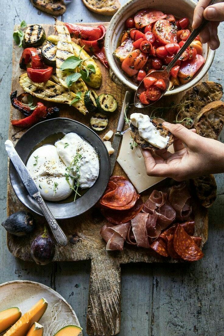 Antipasto board with roasted vegetables and meats